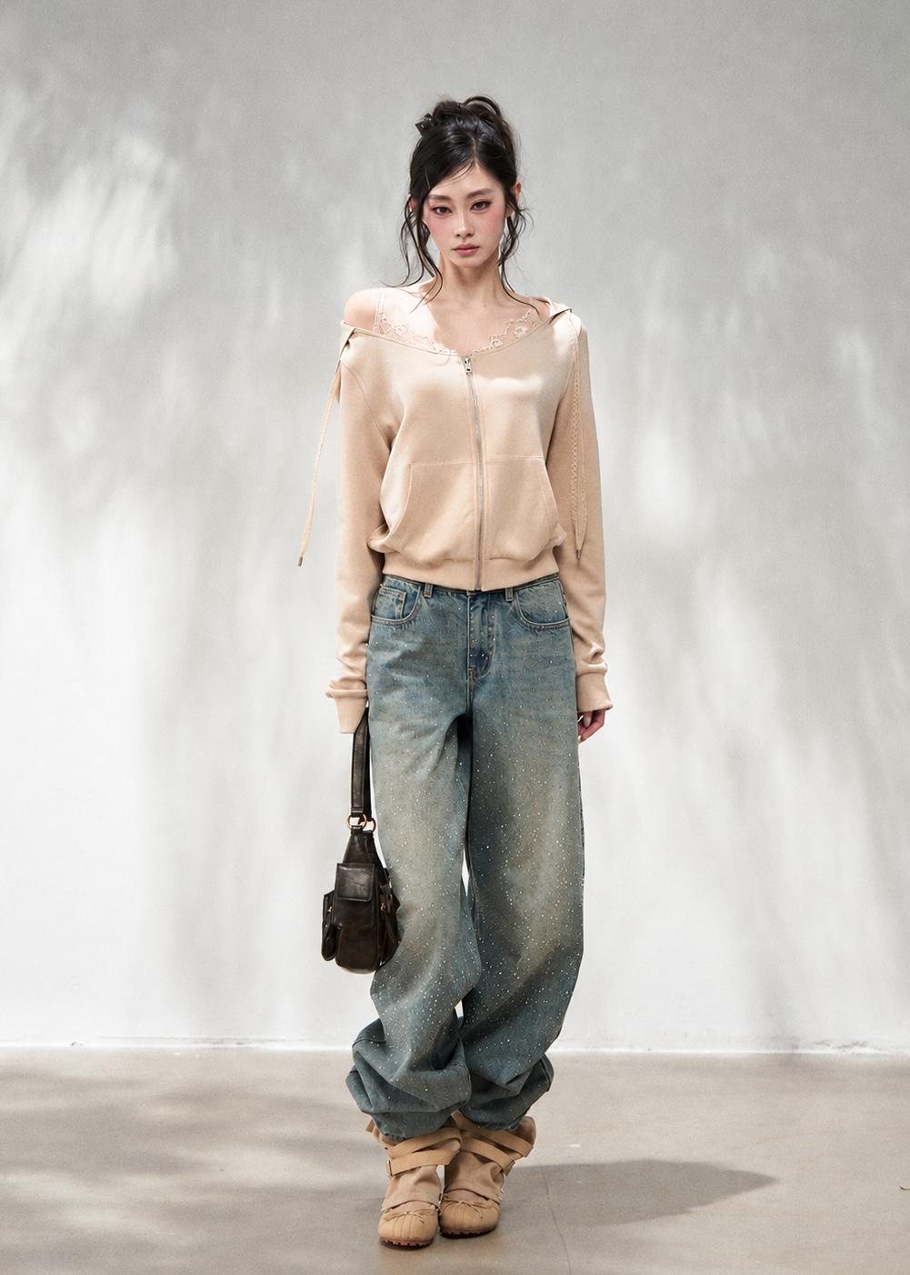 Soft lyocell blend long sleeve hoodie with shoulder strap accents