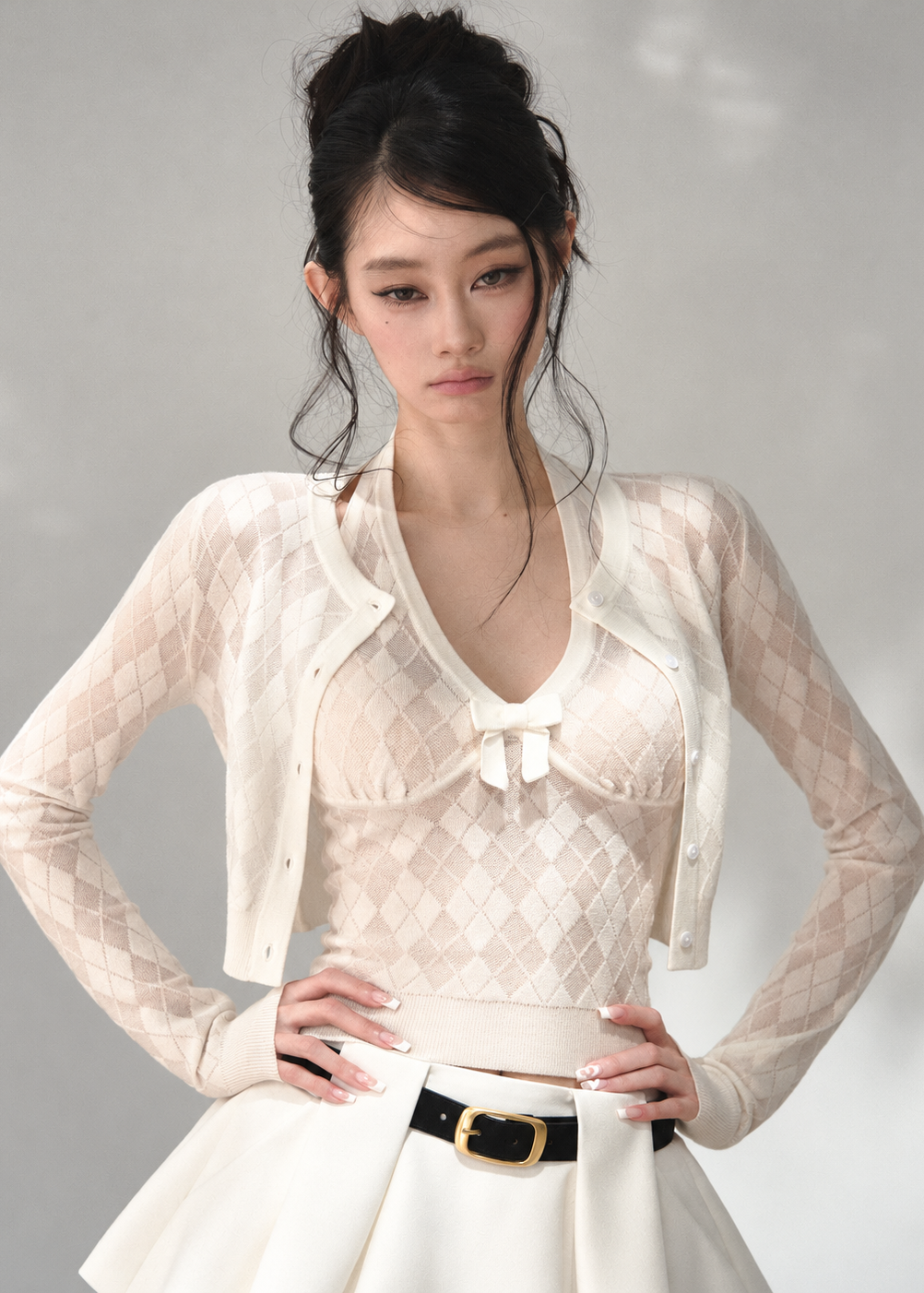 Milky white cropped cardigan with matching open-back halter top