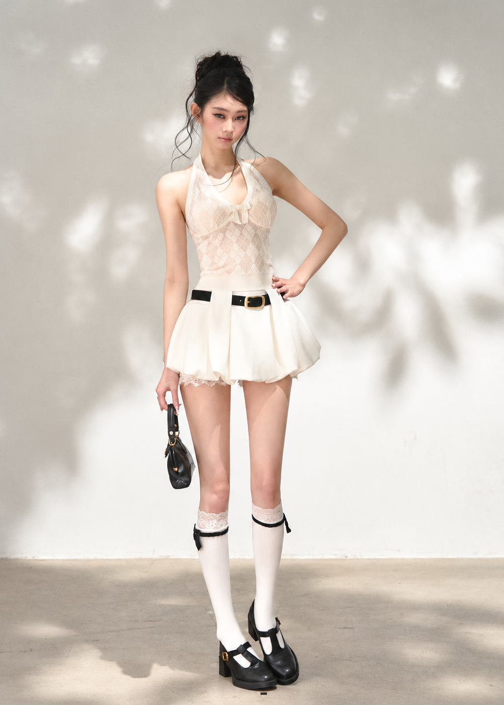 Milky white cropped cardigan with matching open-back halter top