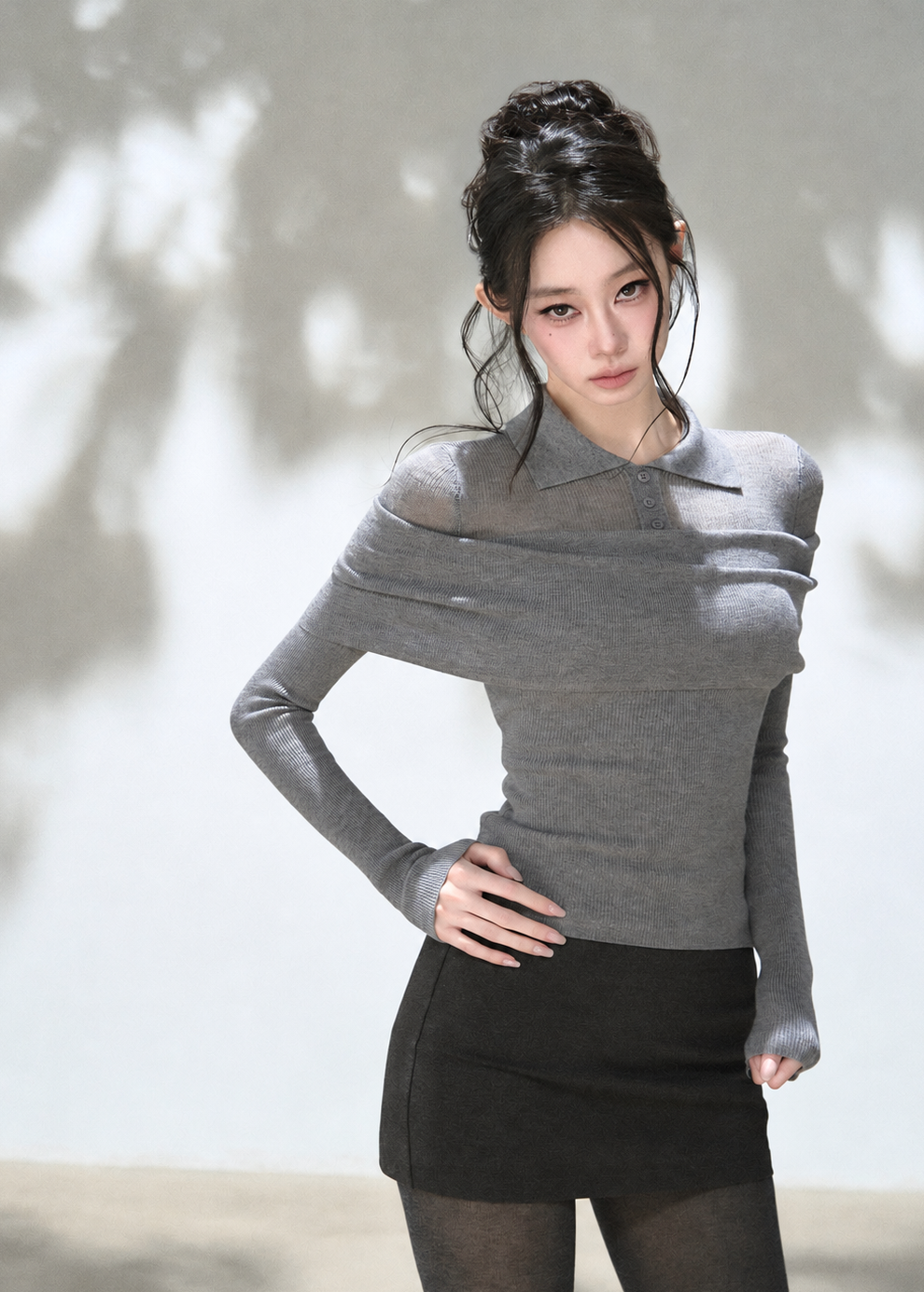 Grey off-shoulder draped polo knit top with foldover neckline