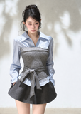 Blue striped shirt with grey textured knit corset overlay and waist tie