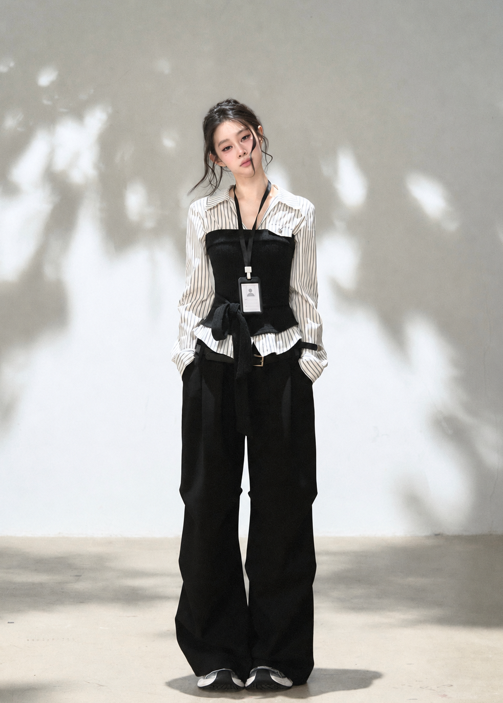 Women's collared striped shirt with textured corset-style knit panel