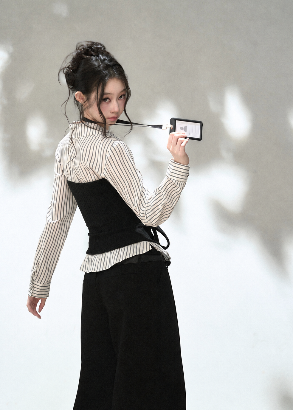 Women's collared striped shirt with textured corset-style knit panel