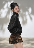 Black double-breasted cropped faux leather jacket with stand collar