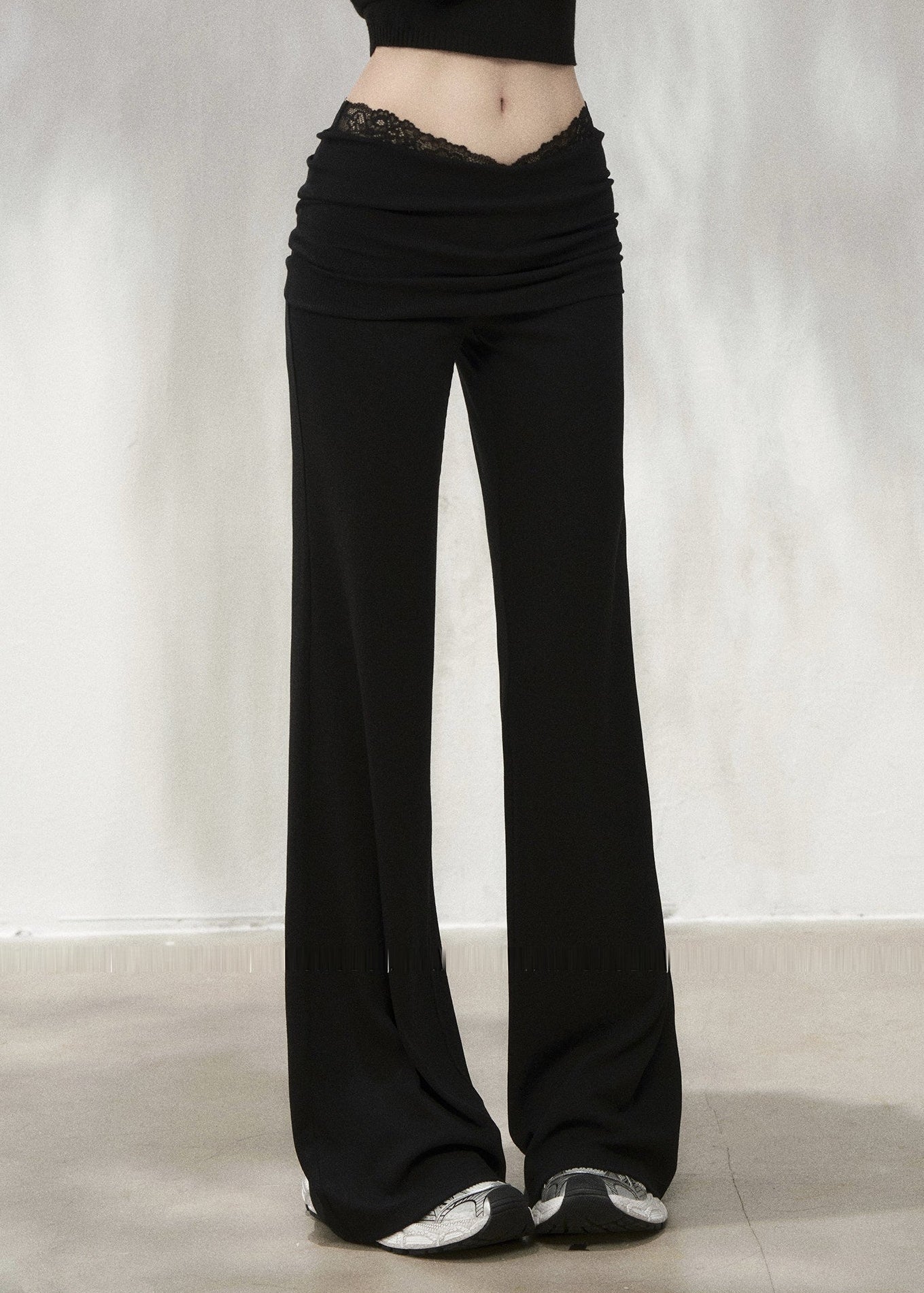 Grey lace-trim flare pants with ruched fold-over waistband