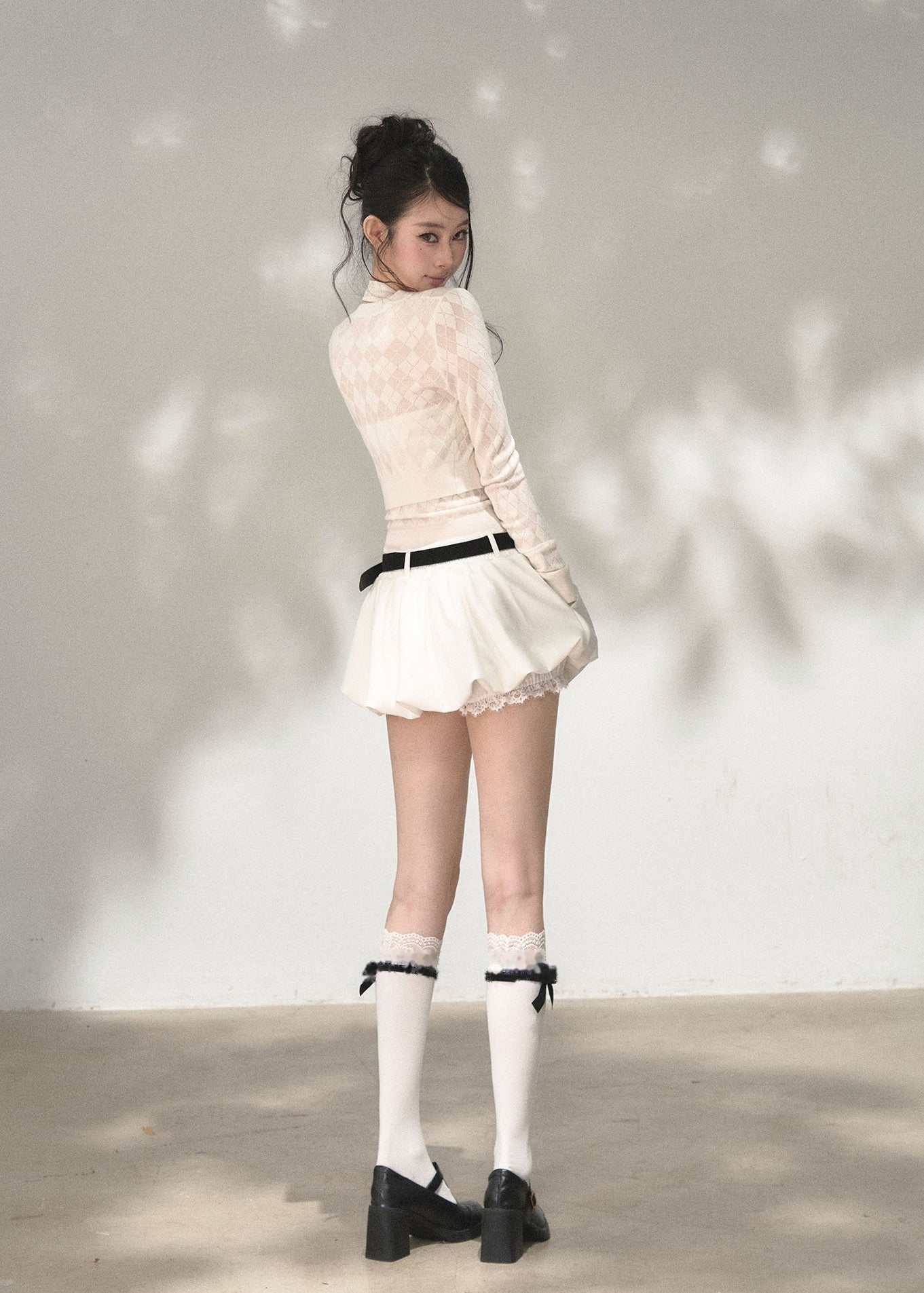 Milky white cropped cardigan with matching open-back halter top
