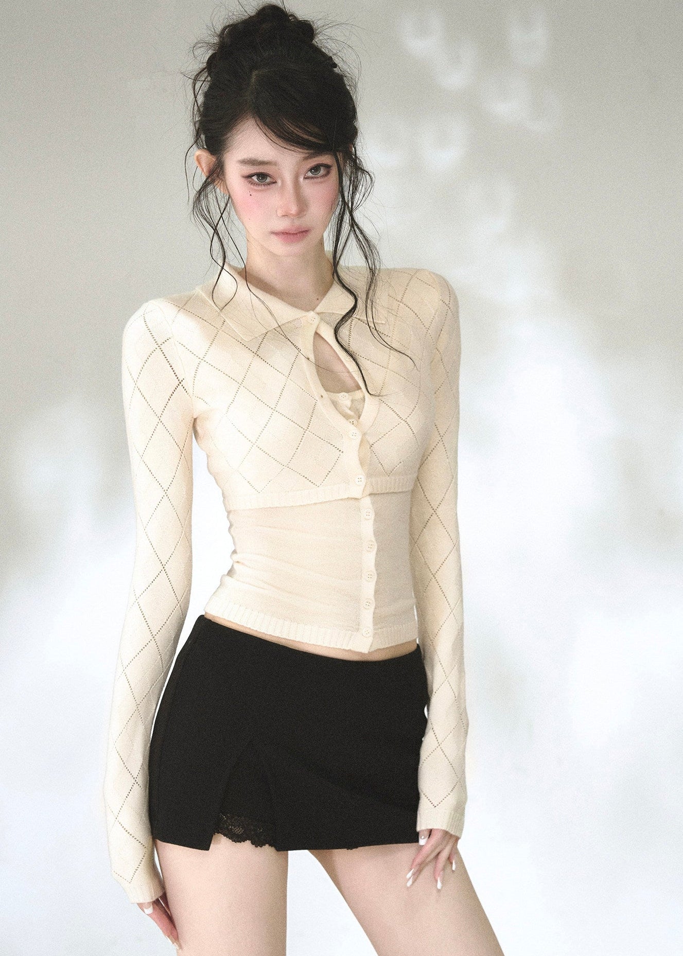 Ivory argyle knit cardigan with pointed collar and keyhole neckline