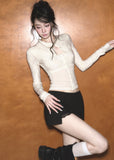 Cream faux layered knit cardigan with delicate diamond pattern