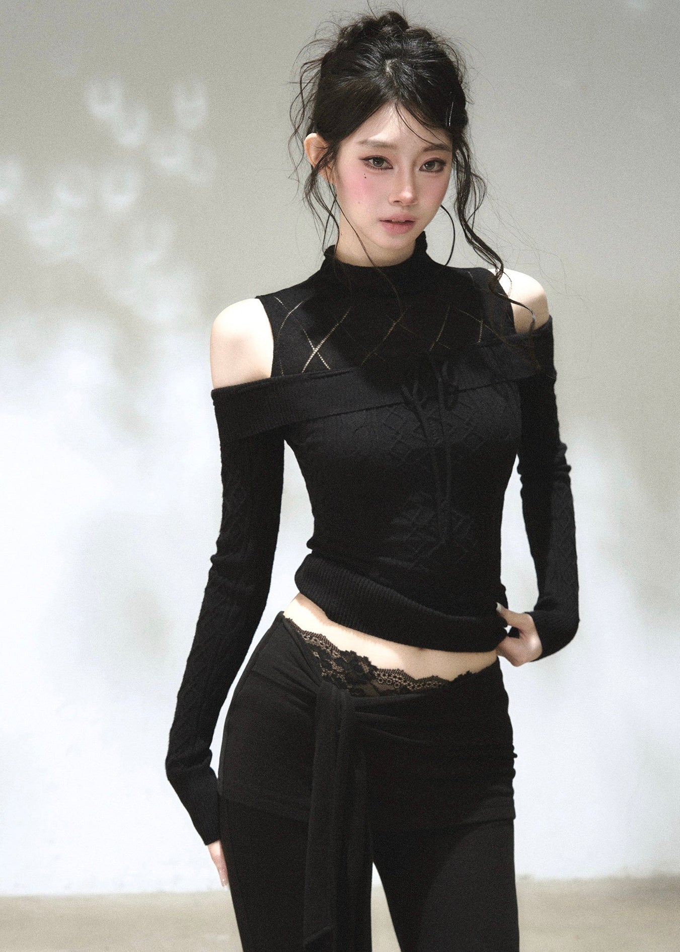 black slim fit off shoulder knit top with mock neck