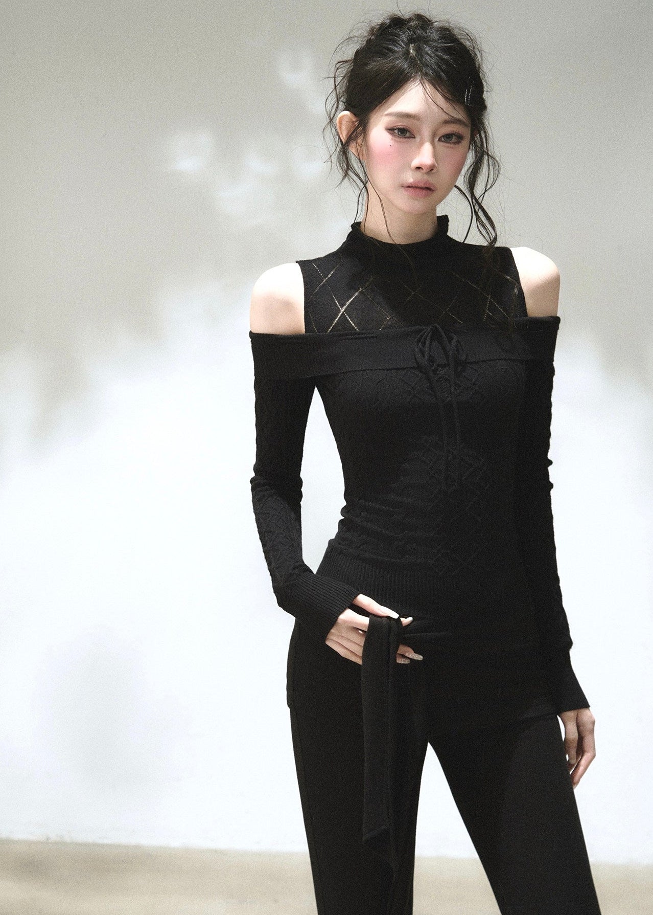 long sleeve cable knit top with diamond pattern detail