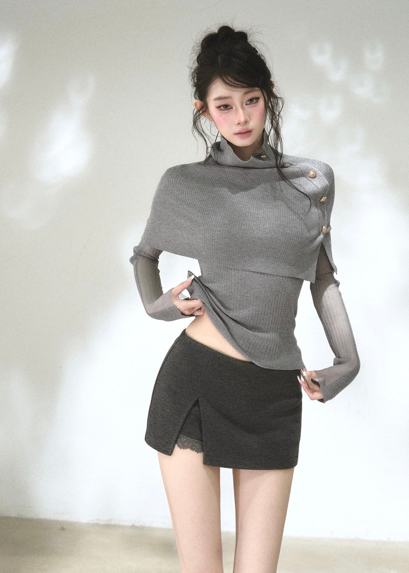 Dark grey lace-trim mini skort with asymmetric front slit