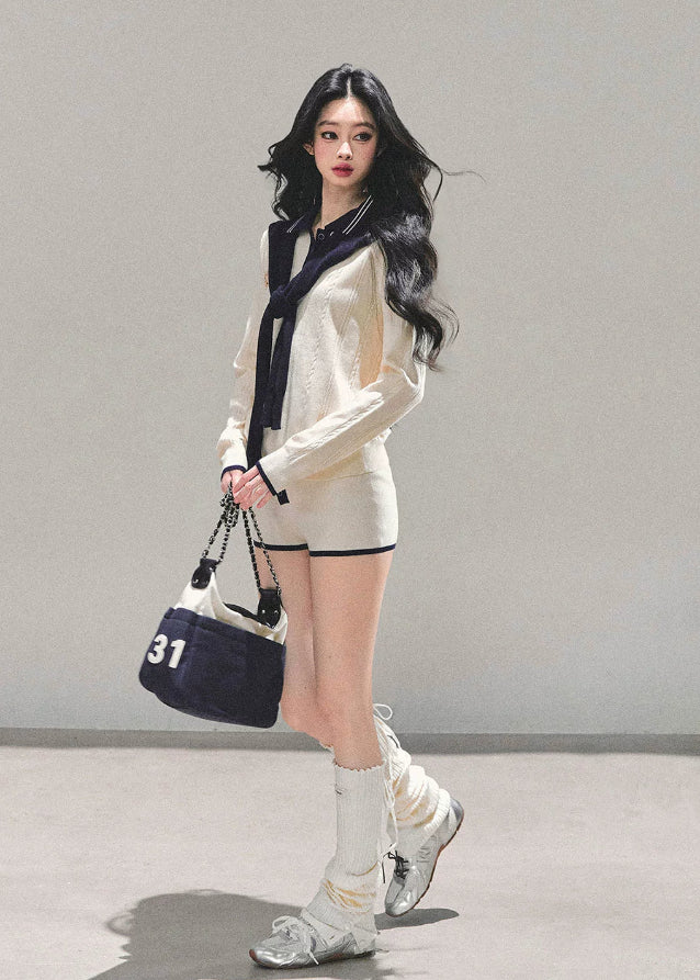 AOMALM knit set, AOMALM morning mist knit, Korean preppy knit outfit, cream navy knit two piece, varsity knit short set, autumn winter knit co ord, soft girl Korean fashion, long sleeve knit top and shorts, K fashion loungewear set, cozy college style outfit, feminine Korean knitwear, Seoul street preppy style, Korean knit shorts set, cute knit two piece for winter, soft knit polo top