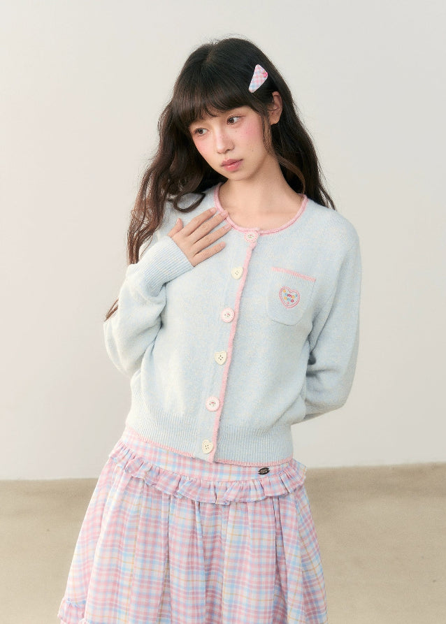 pastel cardigan, heart embroidery knit, contrast trim sweater, Korean girly fashion, AW soft knitwear, umoumo aesthetic cardigan, sweet colored yarn knit, pastel blue cardigan, cute heart badge knit, feminine Korean outfit, loose cozy knit jacket, pink button cardigan, soft winter knit, Fragileheart aesthetic, girly pastel style, cute short cardigan, warm autumn winter knit top, Korean cute girl sweater