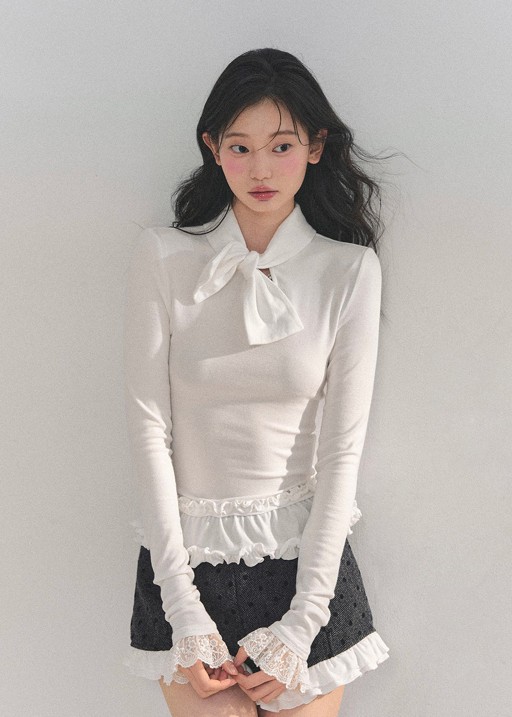 AOMALM top, Korean style knit top, fungus ruffle hem, bow lace T-shirt, winter feminine top, lace cuff long sleeve, soft knit blouse, aesthetic Korean fashion, winter layering top, slim fit tee women, elegant knitwear, ruffle lace shirt, cute winter tops, Korean girl outfit, soft girl aesthetic top, feminine long sleeve tee, winter fashion 2025, trending Korean tops, lace trim sweater top, chic bow neck shirt, romantic knit top.