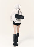 Back view of a white hooded cardigan featuring an angel wing graphic