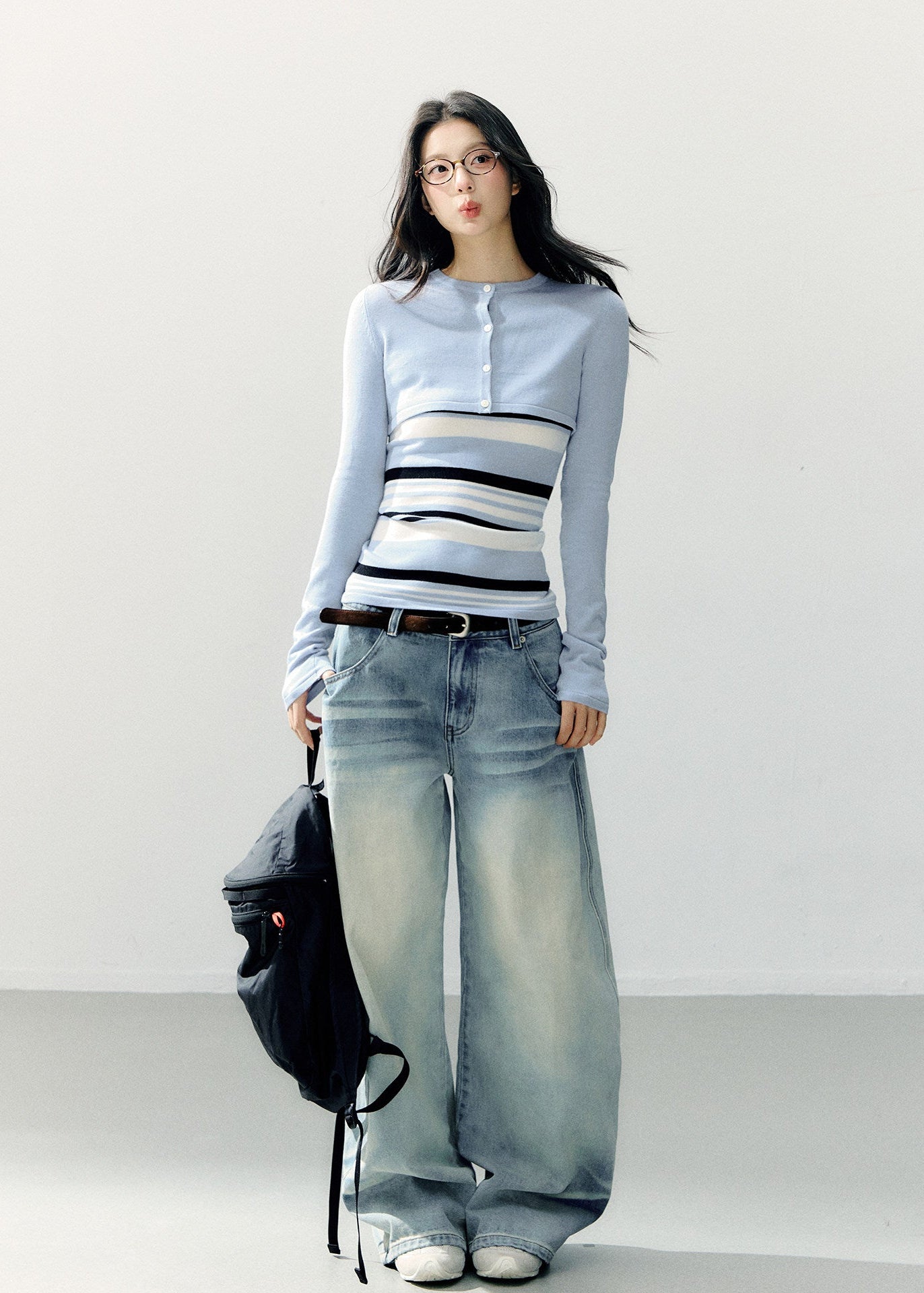 Pale blue cropped bolero with a navy and white striped camisole