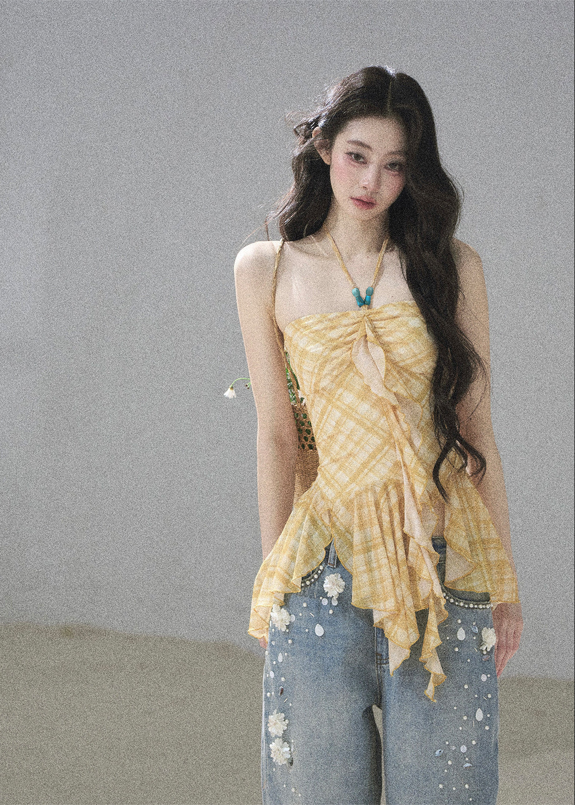 Women’s golden gingham cami top with flowing ruffle details