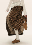 brown plaid skirt, layered midi skirt, patchwork check skirt, ruffle plaid skirt, autumn winter outfit women, mocha mid length skirt, fw25 collection, street boutique fashion, korean plaid fashion, tokyo style skirt
