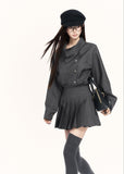 trench style mini dress women, pleated waist dress, british college dress women, edgy commuter dress, lapel mini dress women, dark minimalist fashion dress, vock dress style, tailored spring dress women, urban preppy dress, waist shaping mini dress, alternative office wear women, structured pleated dress, modern black gray dress, controlled silhouette fashion, early spring women dress