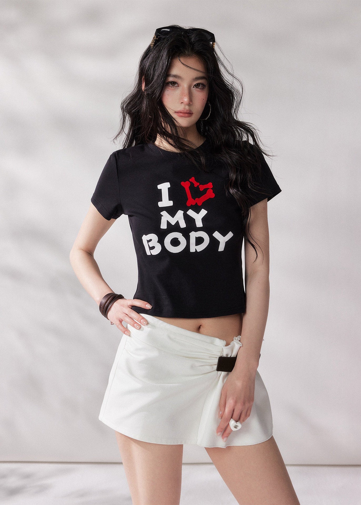 high waist mini skirt, belted mini skirt women, shirred waist skirt, irregular a line skirt, white mini skirt, black mini skirt, american style skirt, summer skirt women, korean fashion skirt, stylish casual skirt, trendy summer outfit, city style outfit women