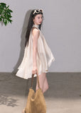 Sleeveless A-line top with soft asymmetric drape