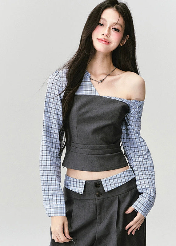 Where intellect meets allure — the Philosophical Trajectory Set redefines structured femininity through sculpted tailoring and poetic imbalance. The asymmetric neckline bares one shoulder in quiet defiance, merging plaid intellect with charcoal precision. Designed for the woman whose grace carries both thought and edge.