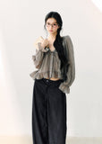 Smoky gray ruffled V-neck blouse with front ties