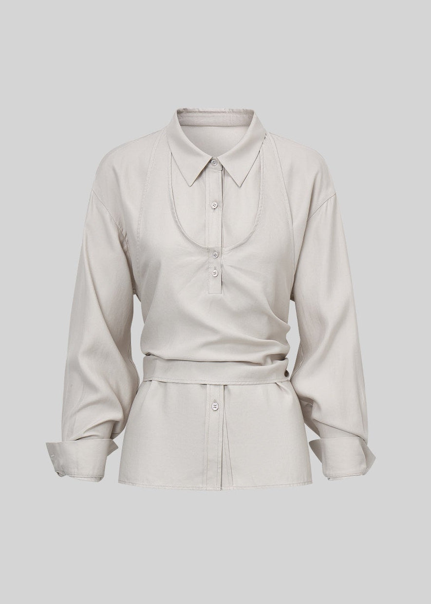 Korean-style blue button-up shirt with a coordinating draped layer