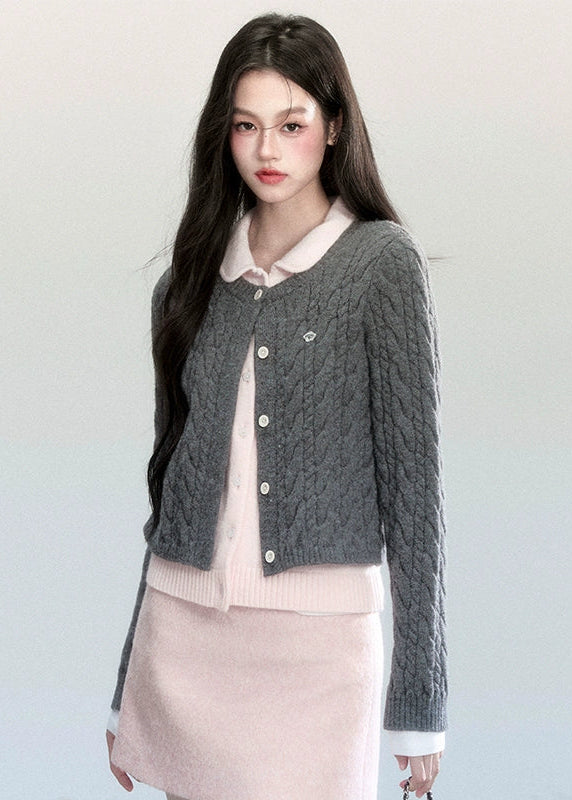 Fragileheart knit cardigan, faux two-piece sweater, doll collar knit top, luxury Korean fashion, quiet luxury womenswear, pastel noir aesthetic, elegant preppy outfit, 2025 winter K-fashion, contrast knit sweater, modern feminine knitwear, chic two-tone cardigan, sophisticated Korean look, soft autumn outfit, refined luxury fashion
