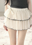 Layered cake mini skirt with black trim detail