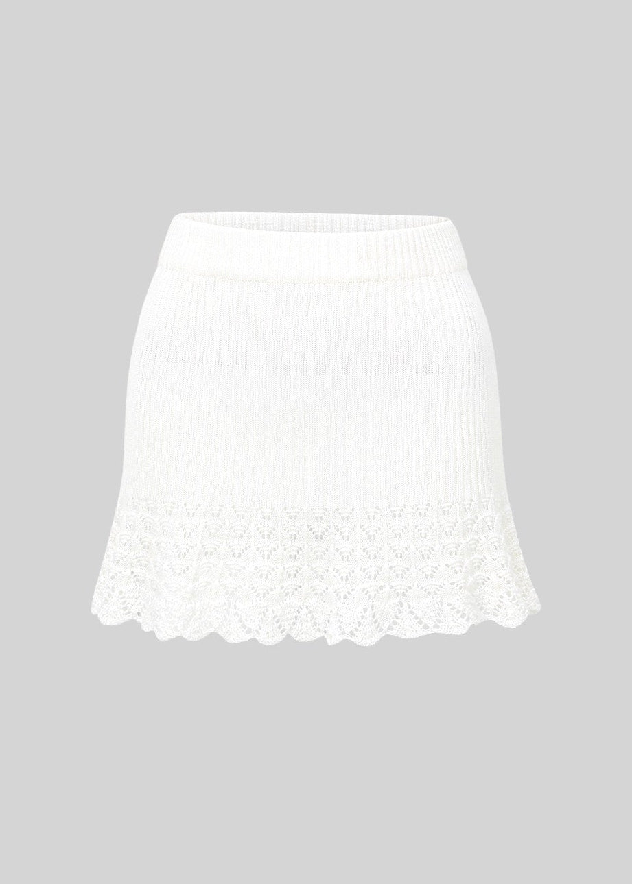 hollow knit top and skirt set, French knit skirt set, feminine Korean two piece set, cream knit mini skirt set, romantic knit outfit women, soft knit matching set, slim fit top and skirt set, elegant mini skirt set, dressy knit co-ord women, cute Korean skirt set, date outfit two piece set, soft cream knit set, fitted knit top women, feminine coordinated outfit, LaLuneDuCiel style clothing