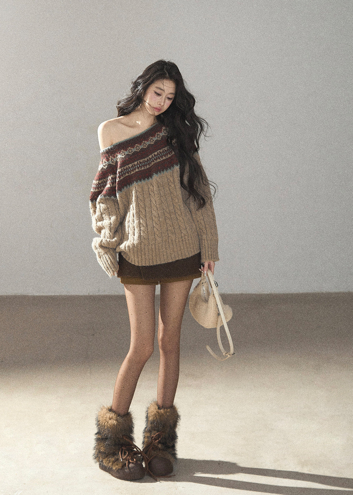 Beige Fair Isle off-shoulder cable knit sweater with multicolor jacquard pattern