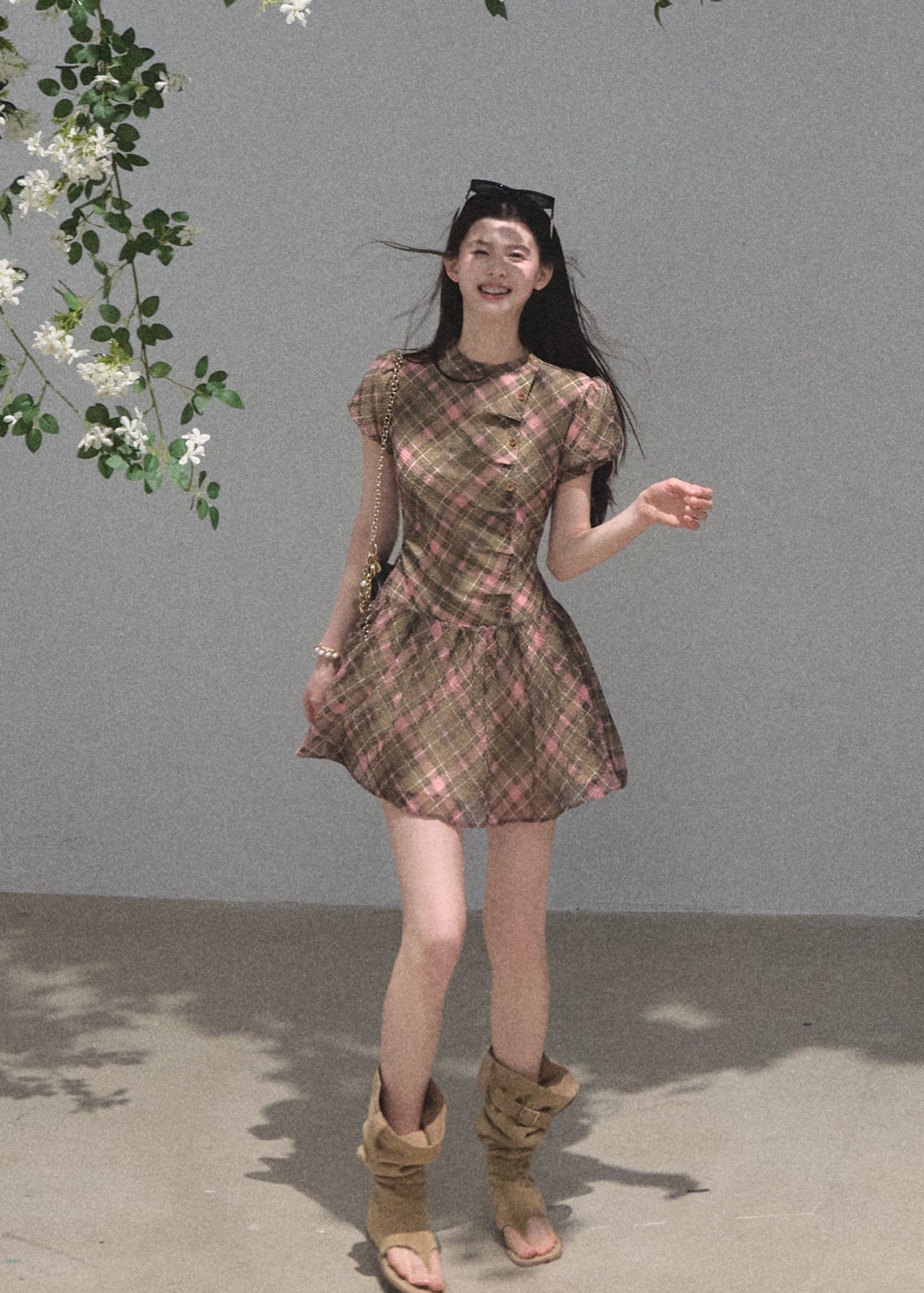 Green plaid mini dress with button detail