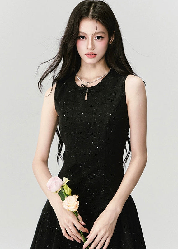 A constellation of refinement — the Noir Étoile Ensemble merges classic Parisian tailoring with Fragileheart’s pastel-noir sensuality. The cropped glitter tweed jacket and sculpted mini dress shimmer with quiet confidence, revealing both softness and strength. Perfect for evenings when sophistication meets modern rebellion.