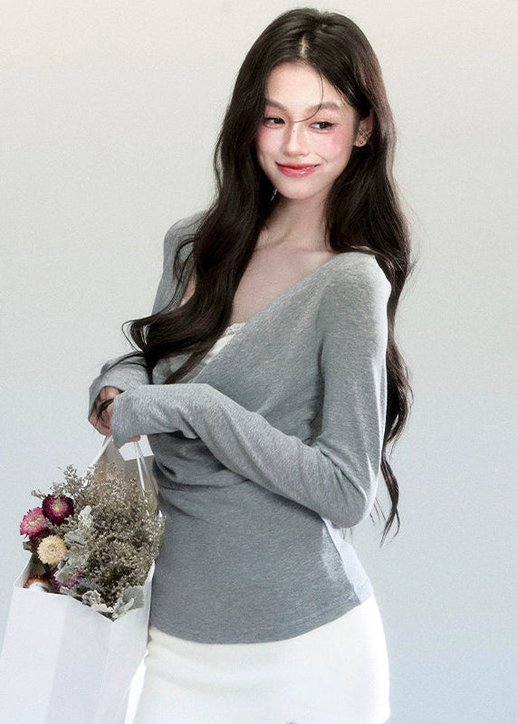 Fragileheart knit top, draped swing blouse, luxury Korean fashion, lace layered knitwear, quiet luxury womenswear, pastel noir aesthetic, grey slim-fit top, elegant autumn outfit, K-fashion 2025, minimalist feminine fashion, modern Korean style, soft two-piece knit, delicate off-shoulder top, refined knit blouse
