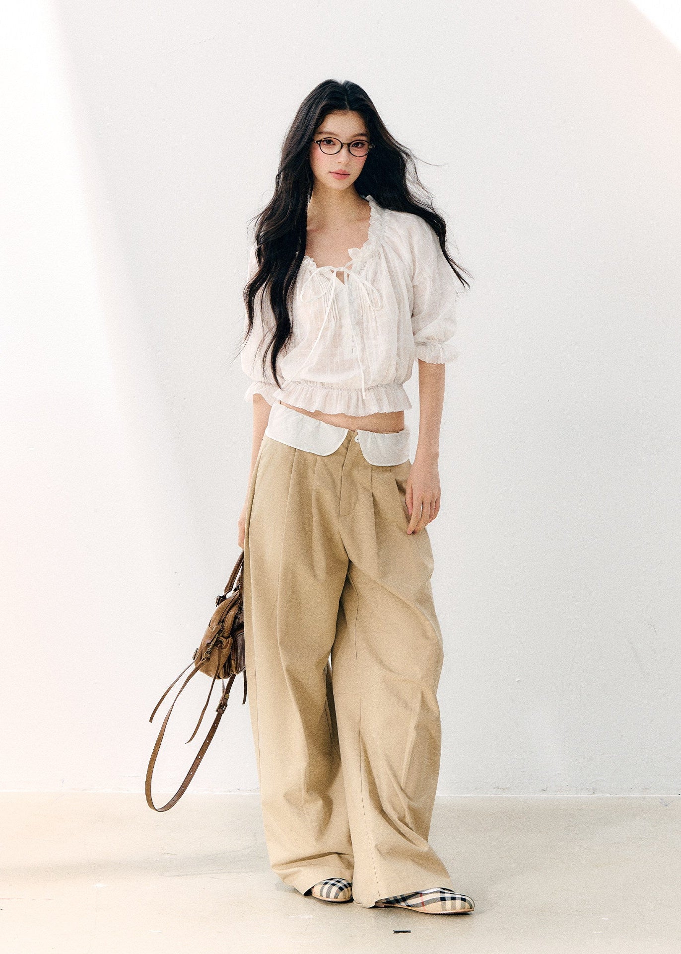 White cotton blouse with gathered wave pleats and puff sleeves
