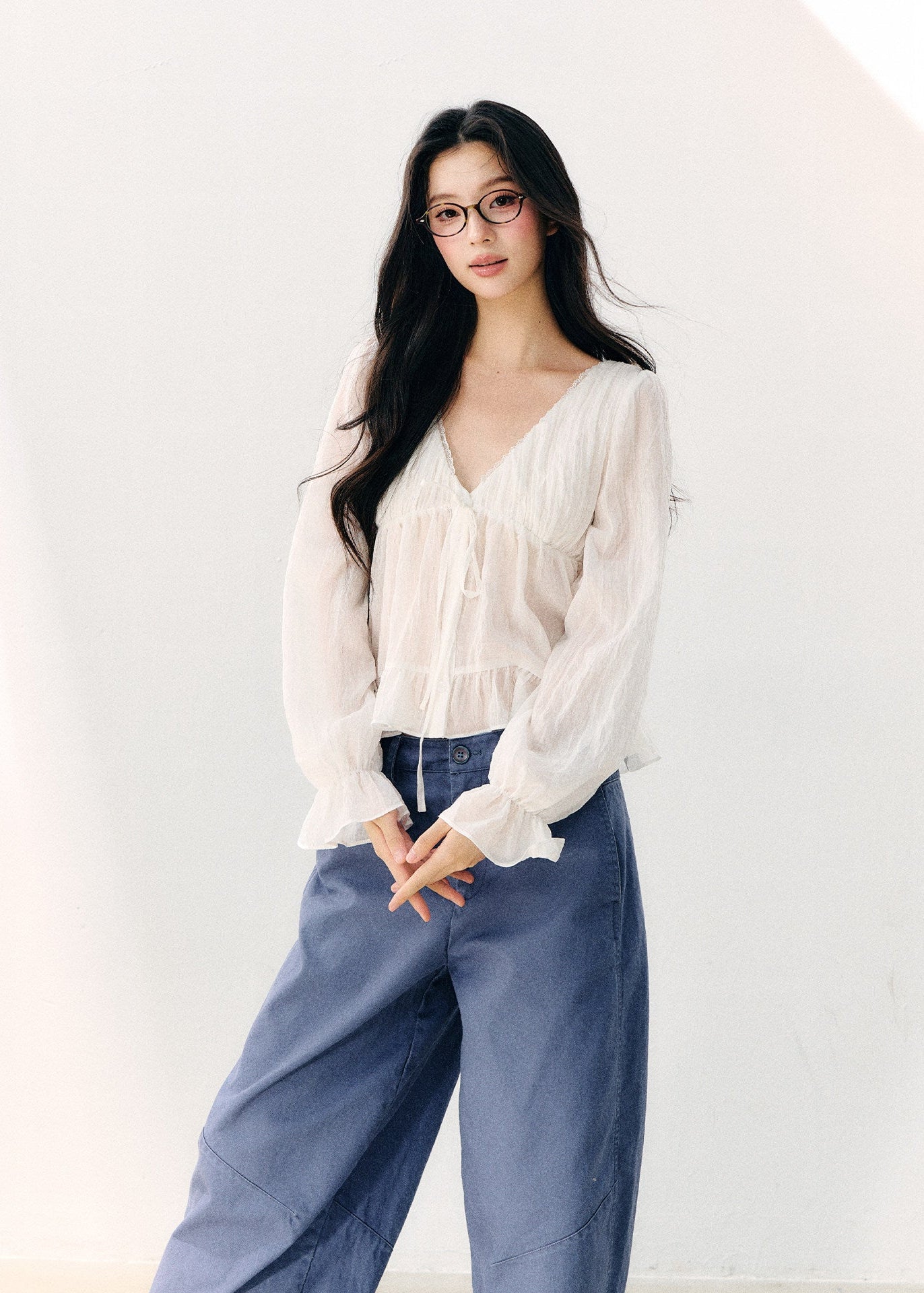 Pale yellow V-neck blouse with double-layer ruffles