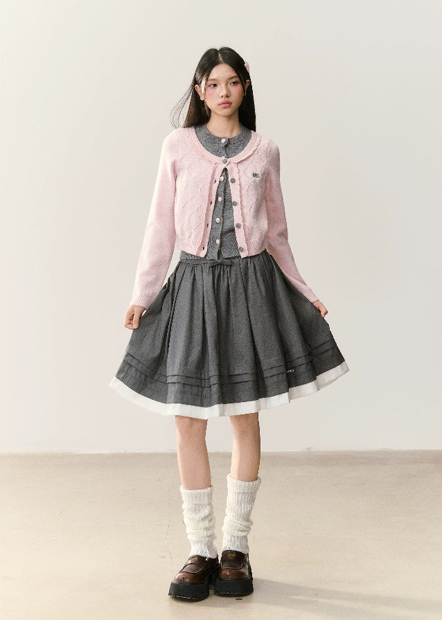 soft pink cardigan, quilted knit cardigan, Korean girly fashion, AW knitwear, layered cardigan set, feminine Korean style, umoumo aesthetic, soft cozy knit, pastel knitwear, grey inner knit top, cute layered outfit, autumn winter Korean style, cropped cardigan look, warm girly sweater, Fragileheart soft mood, sweet soft pink knit, Korean chic outfit, double-layer knit cardigan, girly pastel knit