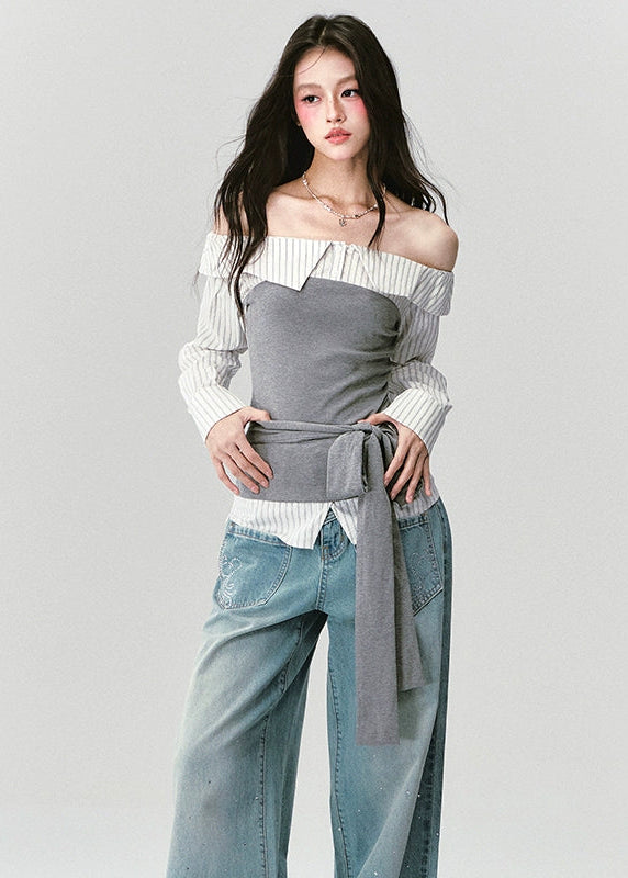 Fragileheart off-shoulder blouse, grey patchwork top, asymmetric layered shirt, luxury Korean fashion, elegant autumn outfit, quiet luxury style, pastel noir aesthetic, K-fashion 2025, structured feminine top, intellectual modern look, pre-fall womenswear, romantic Korean blouse, soft grey knit shirt, delicate tailored outfit
