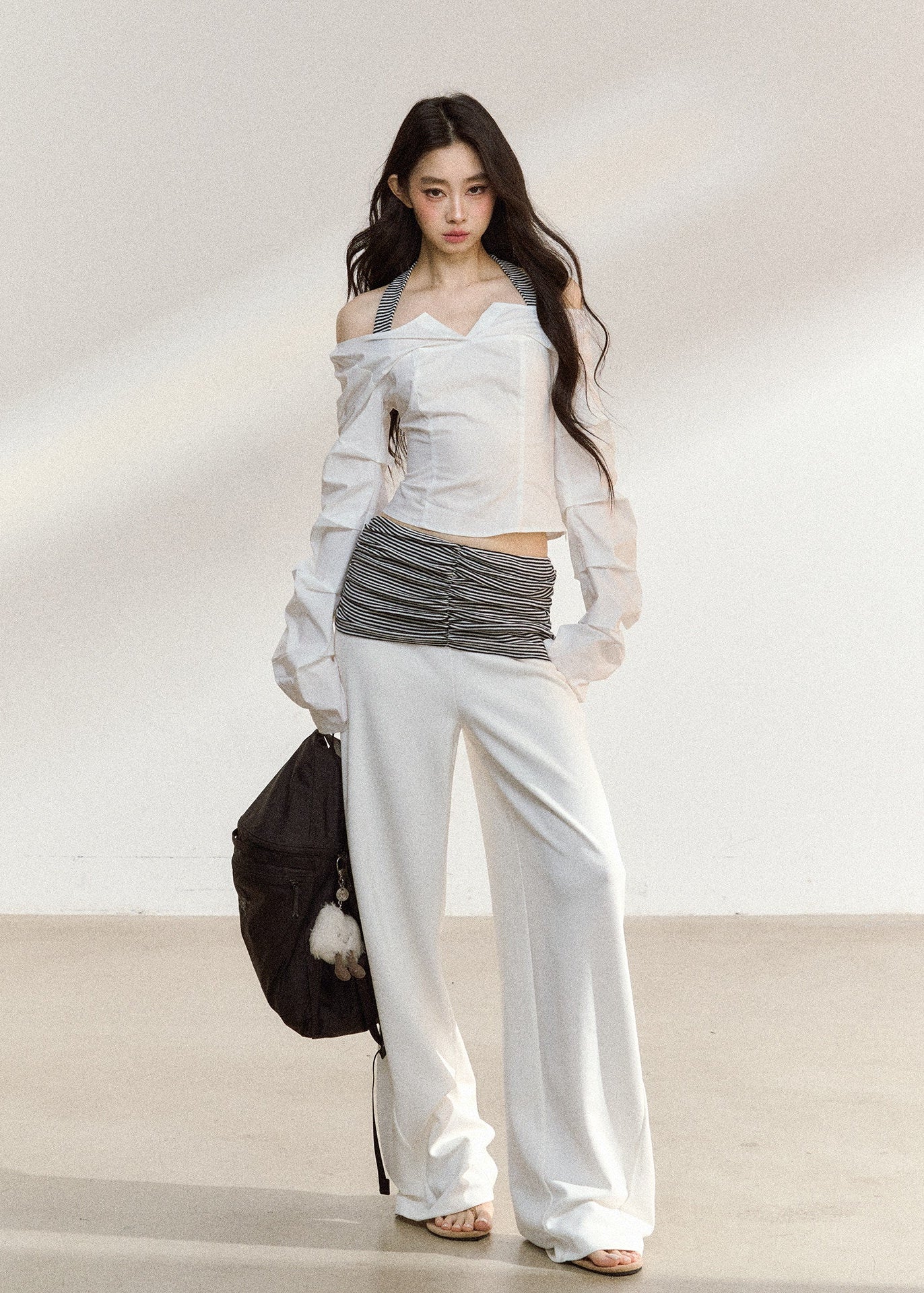 White wide-leg trousers with a ruched striped waistband