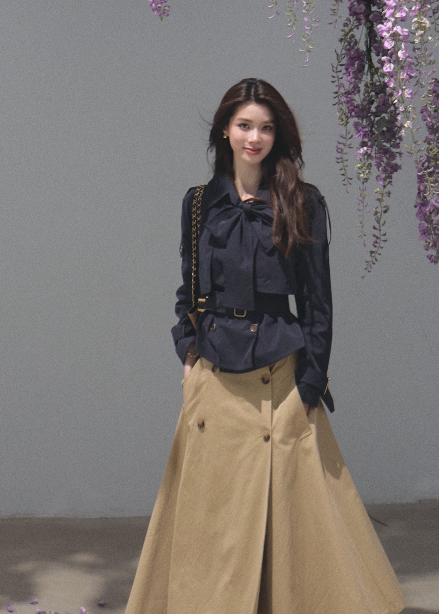 Khaki A-line midi skirt with a coordinating buckle belt