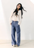 Washed blue straight-leg cotton trousers with a relaxed fit
