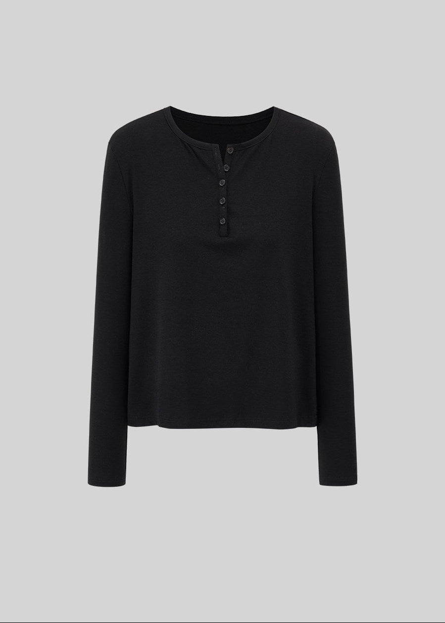 Relaxed black wool-blend Henley shirt styled with plaid pants