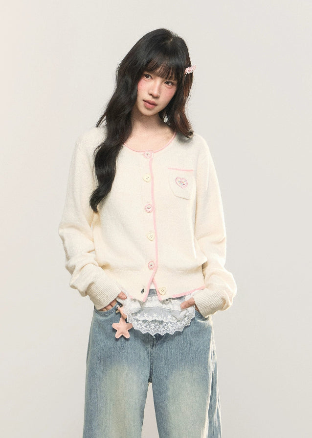 pastel cardigan, heart embroidery knit, contrast trim sweater, Korean girly fashion, AW soft knitwear, umoumo aesthetic cardigan, sweet colored yarn knit, pastel blue cardigan, cute heart badge knit, feminine Korean outfit, loose cozy knit jacket, pink button cardigan, soft winter knit, Fragileheart aesthetic, girly pastel style, cute short cardigan, warm autumn winter knit top, Korean cute girl sweater