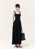 Black cross-print knit maxi dress with cropped pinstriped shrug