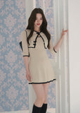 contrast trim mini dress, vintage knit dress, French style mini dress, A-line short dress, waist cinching dress, feminine Korean dress, cream mini dress, square neck dress, elegant summer dress, romantic day dress, soft knit mini dress, fit and flare dress, classy short dress, vintage inspired dress, polished feminine dress