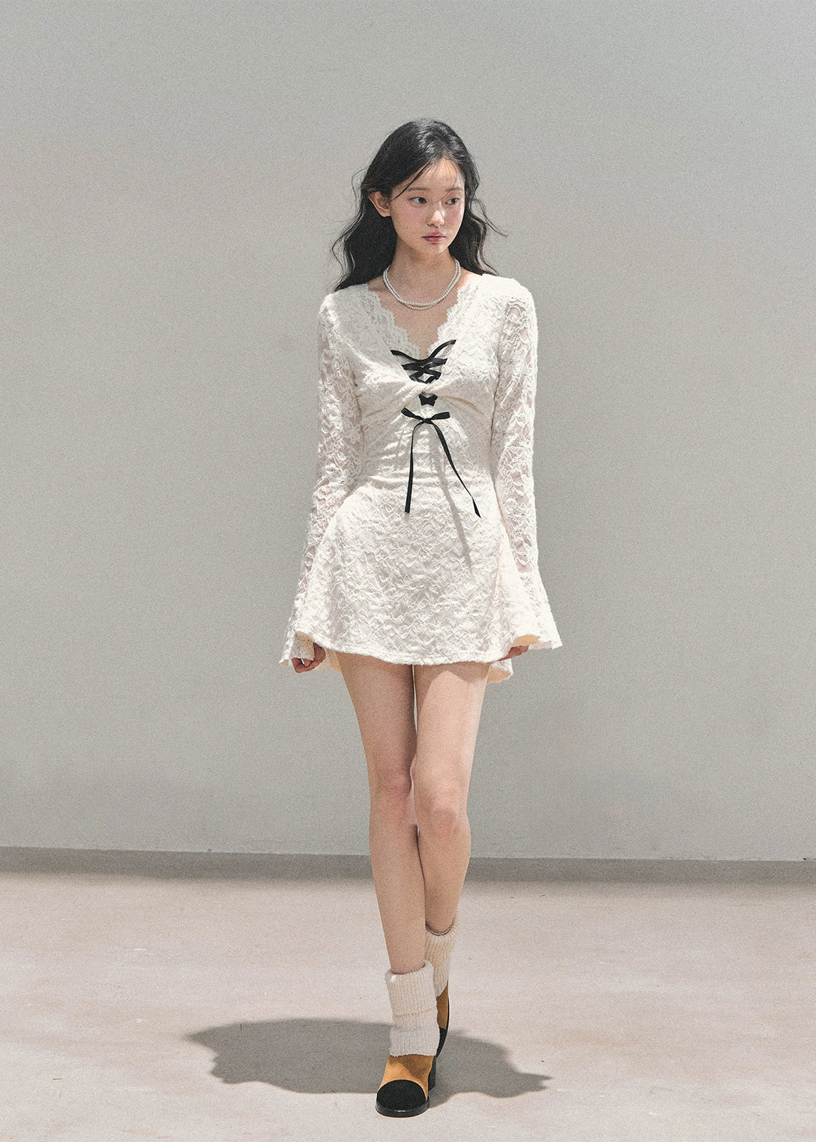 lace mini dress, French style dress, winter lace dress, corset ribbon dress, A-line puffy dress, royal sister style, elegant white dress, holiday party dress, winter date outfit, lace-up V-neck dress, Korean feminine dress, AOMALM dress, long sleeve lace dress, cute winter mini dress, luxury lace fashion, feminine winter outfit, trendy Korean dress, lace flare sleeve dress, puff hem dress, aesthetic white dress