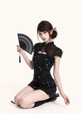Black floral mini dress with a sheer cropped bolero