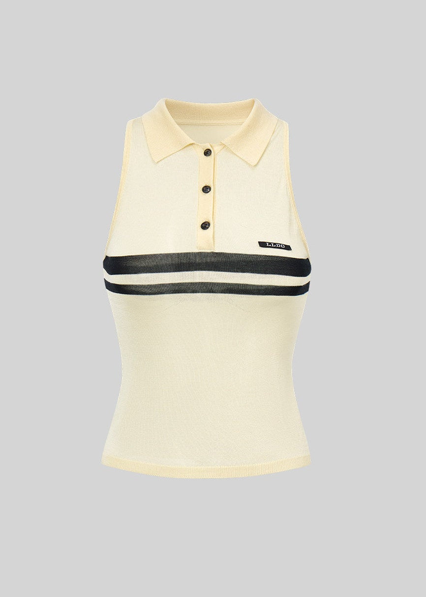 Sleeveless striped knit polo top styled with dark bottoms outdoors