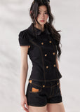 black denim set women, denim two piece set, structured denim outfit, double breasted top women, summer co ord set women, black short set outfit, modern minimalist outfit women, tailored denim set, chic summer outfit women, city style outfit women, fashion forward set women, clean line outfit women, edgy minimal fashion, elevated casual outfit, trendy denim set women